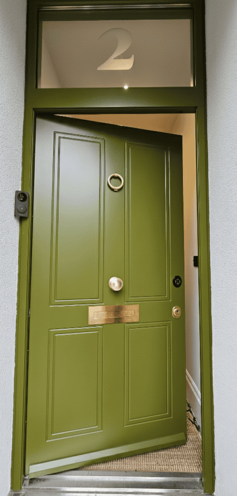 Green security door with keypad reader