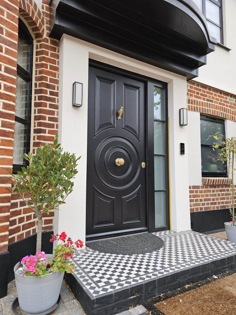 Black circular design security door with sidelight